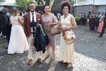 Graduand looks dapper at graduation with his family at his side