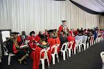 The Academic procession sits ready and waiting to start the graduation ceremony