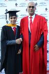 A Master of Commerce graduate Mr Tarish Jagwanth with his Supervisor Dr Rajaram