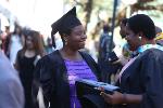 Graduates share a lighthearted moment
