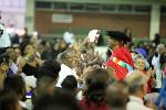 Hugh Masekela walks the red carpet at grad