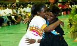 A loving embrace from a proud family member
