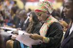 A graduate peruses through the graduation programme